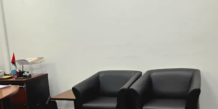 Desks along the north wall of the office