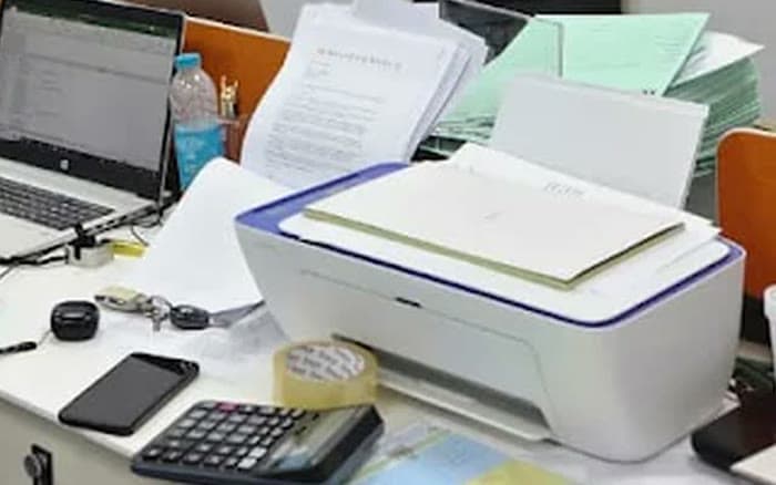 Files and the office printer mid-run