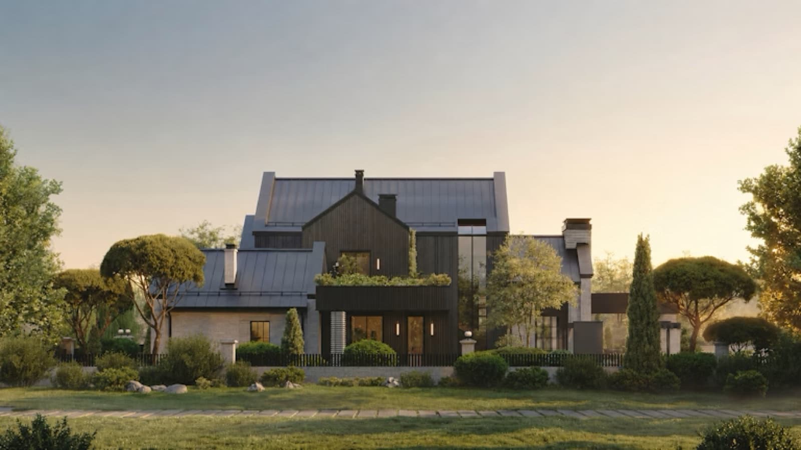 A dark-timber gabled house among trees at golden hour