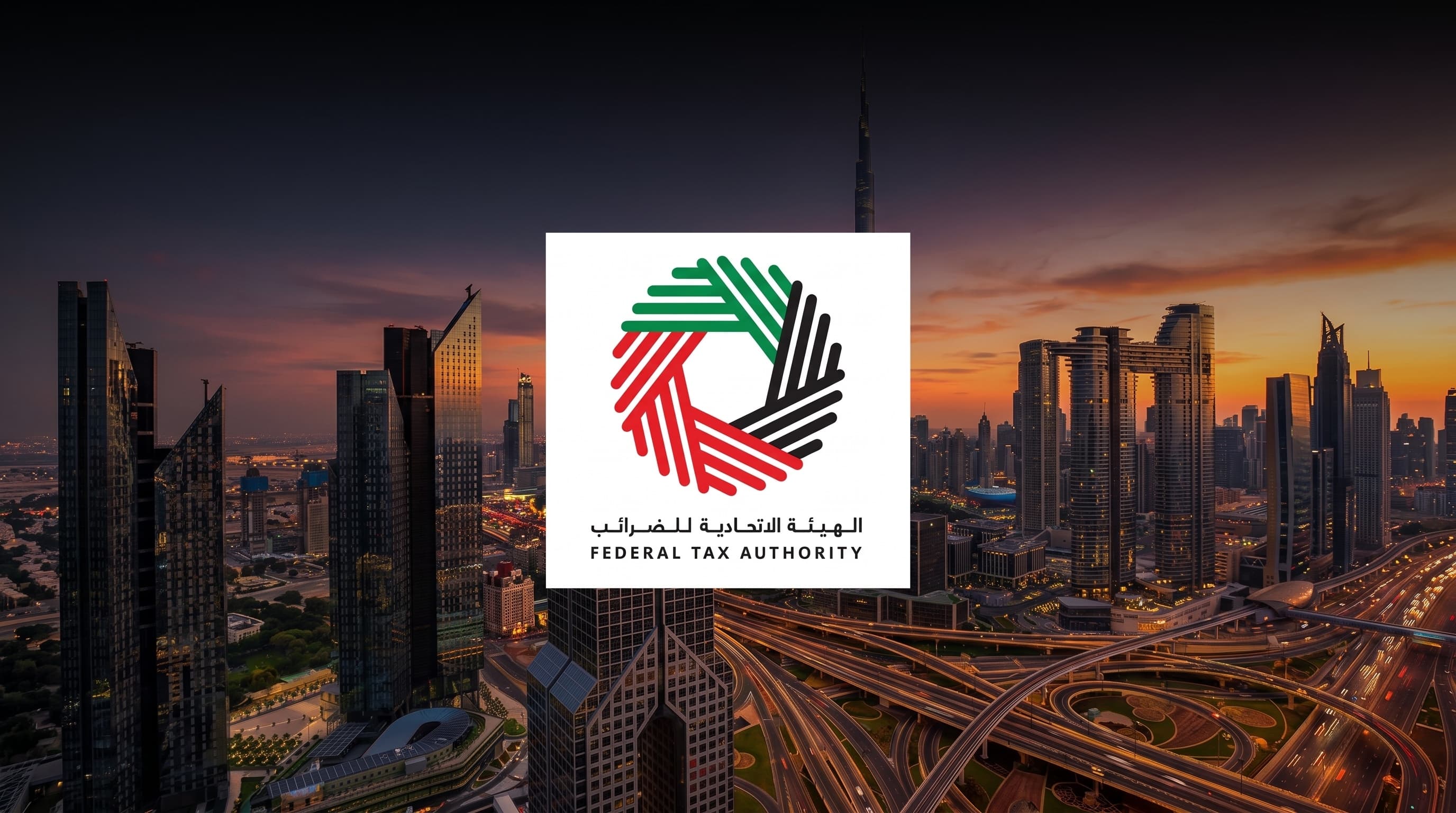 The UAE Federal Tax Authority emblem set against the Dubai skyline at dusk.